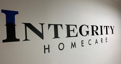 Facility logo on a wall