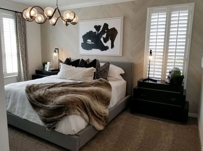 Well-furnished bedroom interior with modern decor