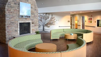 Common area with circular seating and art decor