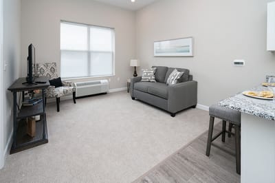 Cozy living room in a senior living facility unit