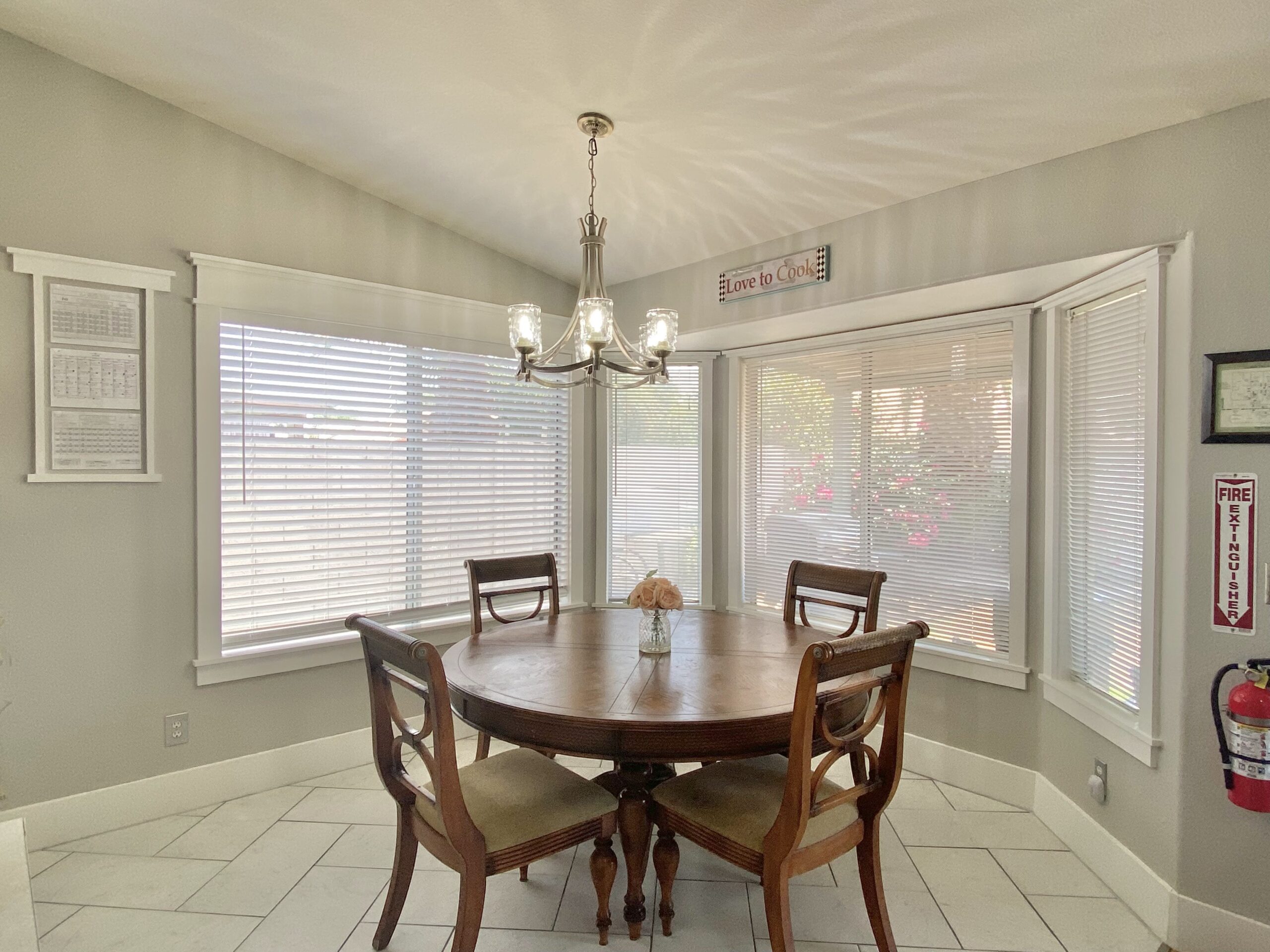 Bright dining area with a round table and chairs