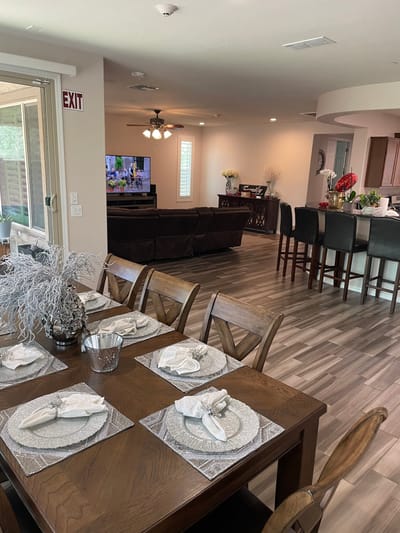 Interior view of a communal living space with dining table