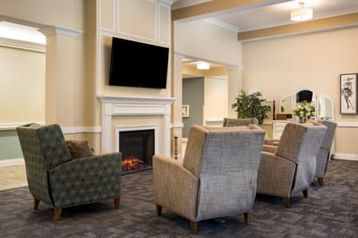 Cozy common area with seating and fireplace
