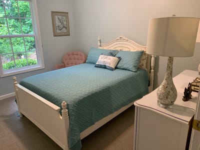 Private resident room with a bed and decorative items