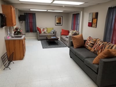 Common area with couches and decorative accents