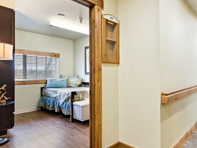 View of a resident room with a bed and furnishings