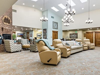 Bright common area with seating and natural lighting