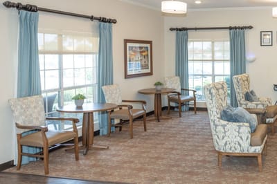 Interior common area with seating and natural light