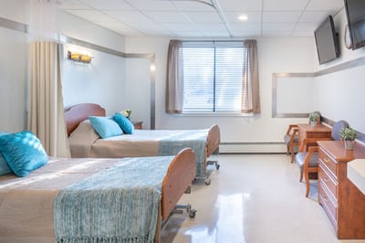 Bright, spacious resident room with two beds