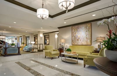 Bright and inviting common area with seating and artwork