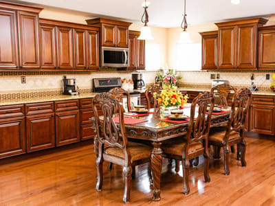 Dining room with elegant wooden table and chairs