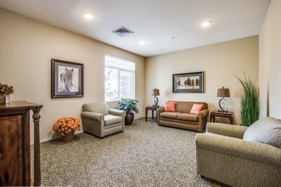 Bright common area with seating and decor