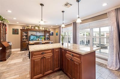 Bright common area with kitchen and dining space
