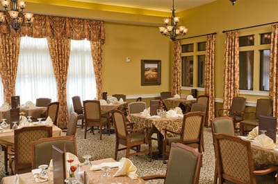 Dining area set with tables and chairs