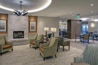Common area with seating and fireplace