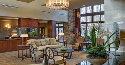 Interior view of a stylish common area with seating