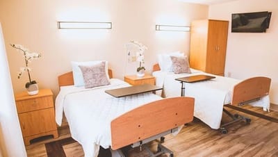 Welcoming shared room with twin beds and modern decor