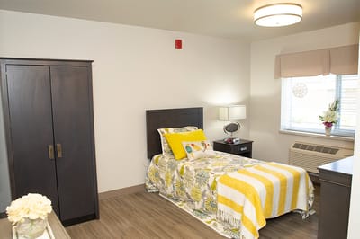 Cozy private resident room with bright decor