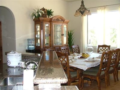 Bright dining area with wooden furniture and decor