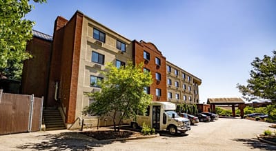 Exterior view of the facility with parking area