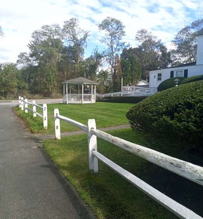 Outdoor gazebo in a green space at the facility