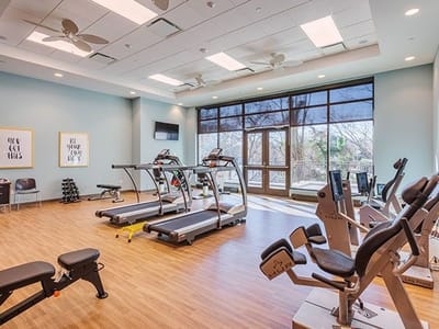 Interior shot of a fitness area with workout equipment