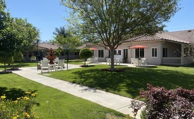 Well-maintained garden space with seating areas