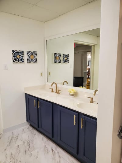 Clean and modern bathroom interior with double sinks