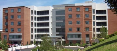 Exterior view of The Leonard Florence Center with landscaping