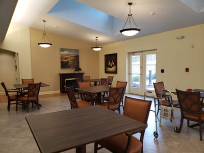 Bright common area with tables and chairs