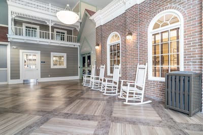 Interior view of a common area with rocking chairs