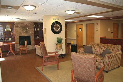 Common area with seating and a fireplace