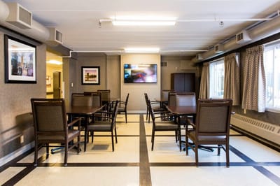 Bright common area with tables and chairs