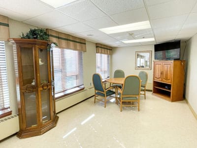 Bright common area with seating and windows