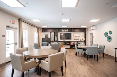 Bright common area with tables and seating