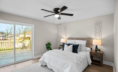 Bright, airy bedroom with a view of the outdoor space