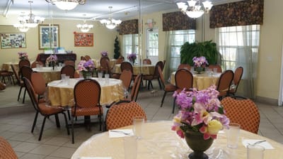 Dining area with tables and flowers