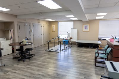 Rehabilitation area with equipment in an interior space