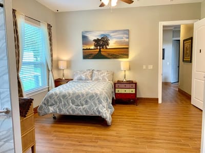 Cozy resident room with natural light and art