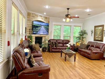 Cozy common area with leather seating and a relaxing ambiance