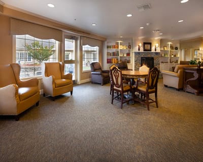 Common seating area with chairs and a table