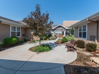 Outdoor courtyard with seating and landscaping