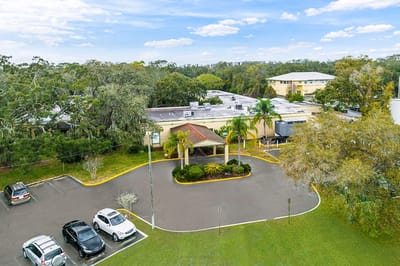 Drone view of the Fairway Oaks Center facility exterior and parking lot