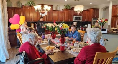 Residents enjoying a meal in the dining area