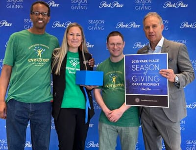 Employees celebrating an achievement at Evergreen Life Services