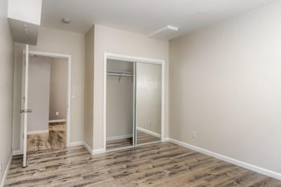 Empty private resident room with wooden flooring