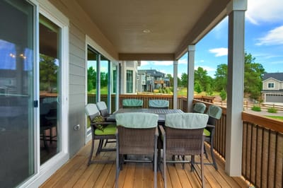 Outdoor patio area with seating and table