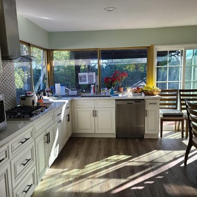 Bright kitchen area with large windows
