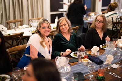 Residents enjoying dinner together in the dining area