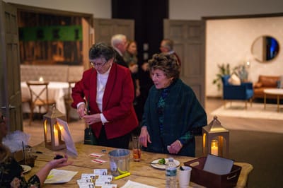 Two residents engaged in an activity in a common area